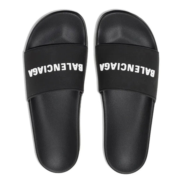 Balenciaga logo-embossed pool slides