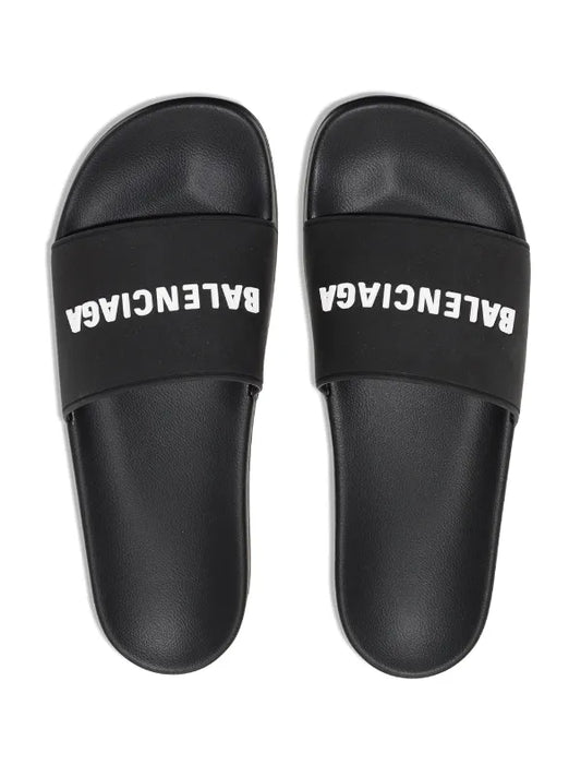 Balenciaga logo-embossed pool slides
